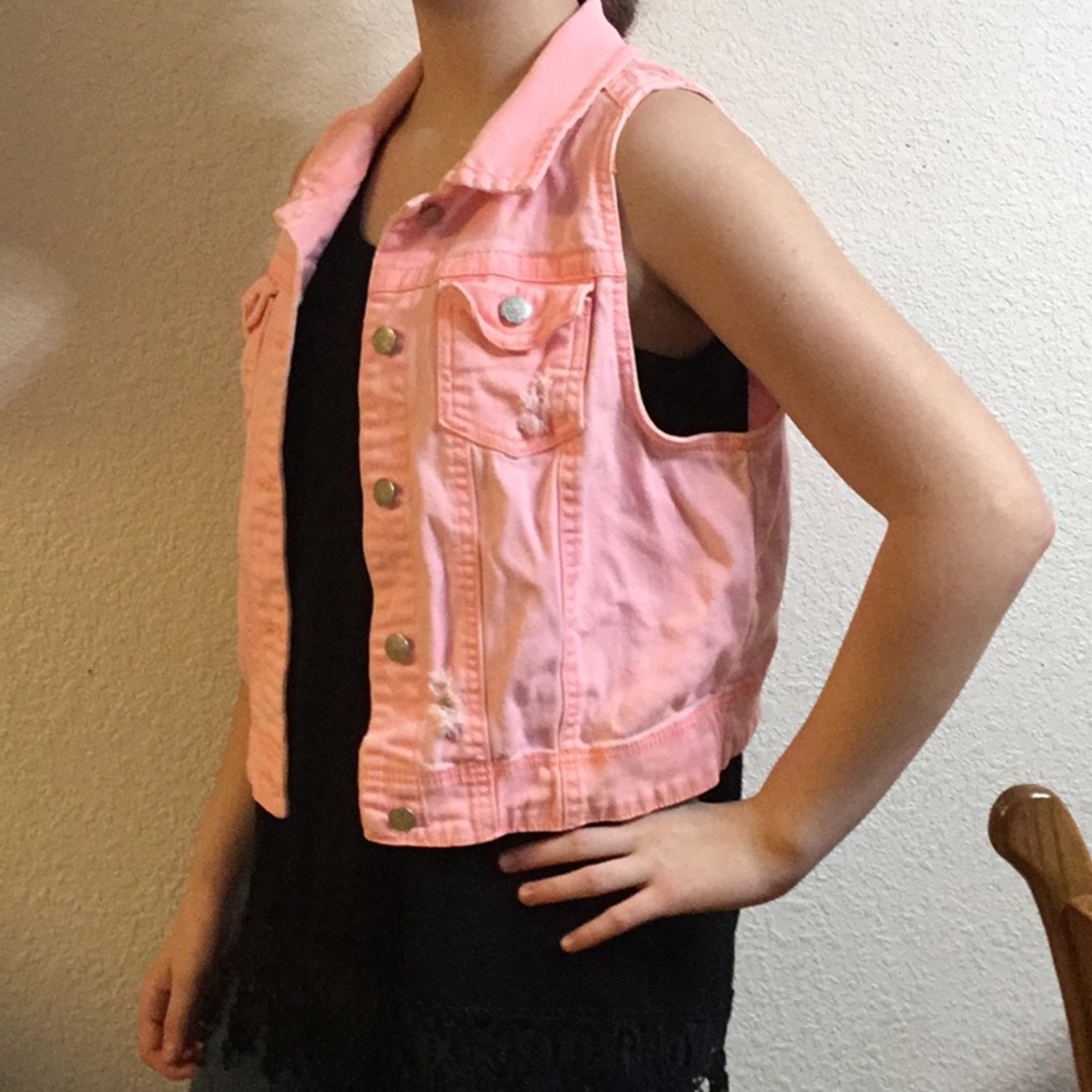 Pink jean jacket.